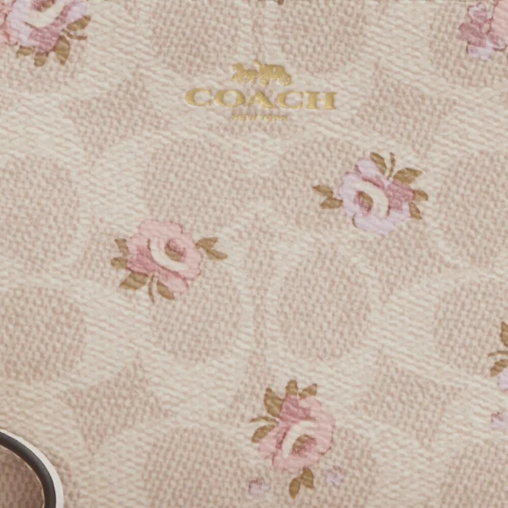 Bolsa de pulsera con cremallera en la esquina, en Signature Canvas con estampado floral