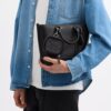 Bolsillo con clip en Signature Canvas