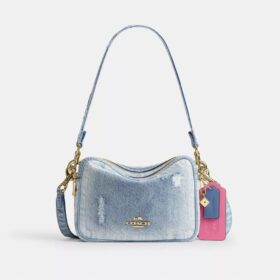 Bolso bandolera Carey en denim desgastado con Charms