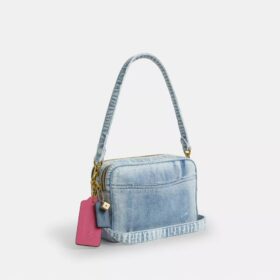 Bolso bandolera Carey en denim desgastado con Charms
