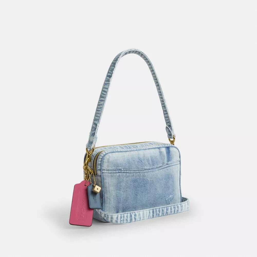 Bolso bandolera Carey en denim desgastado con Charms