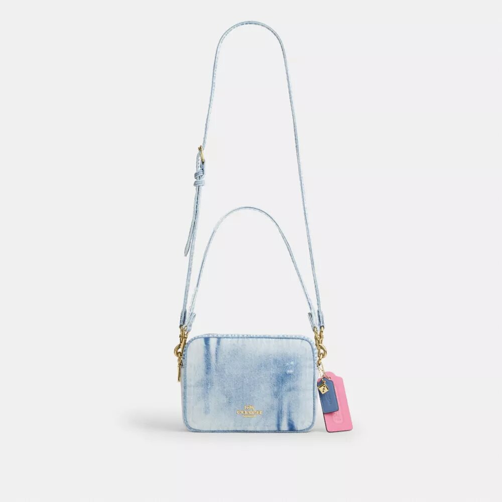 Bolso bandolera Carey en denim desgastado con Charms