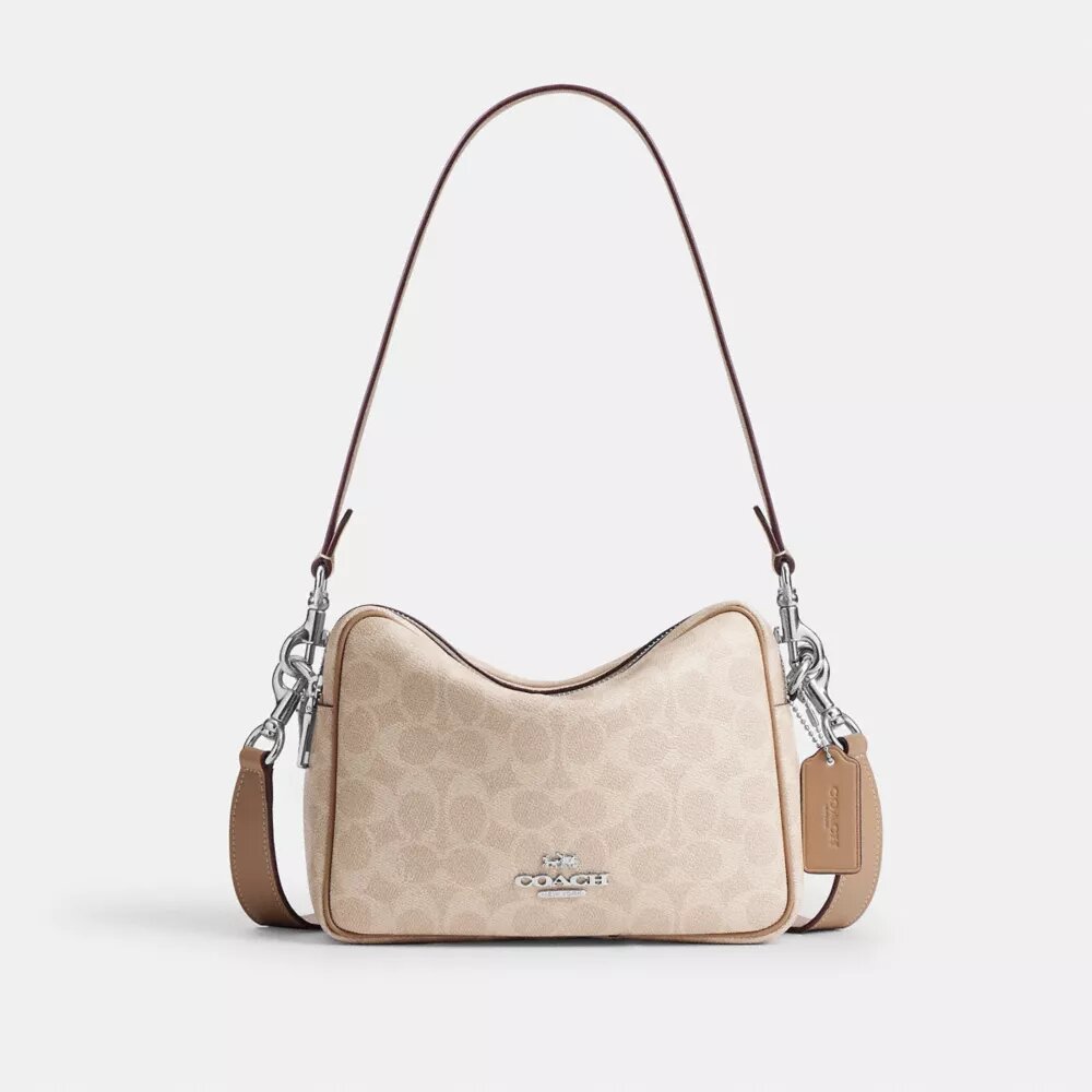 Bolso bandolera Carey en Signature Canvas
