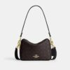 Bolso bandolera Carey en Signature Canvas