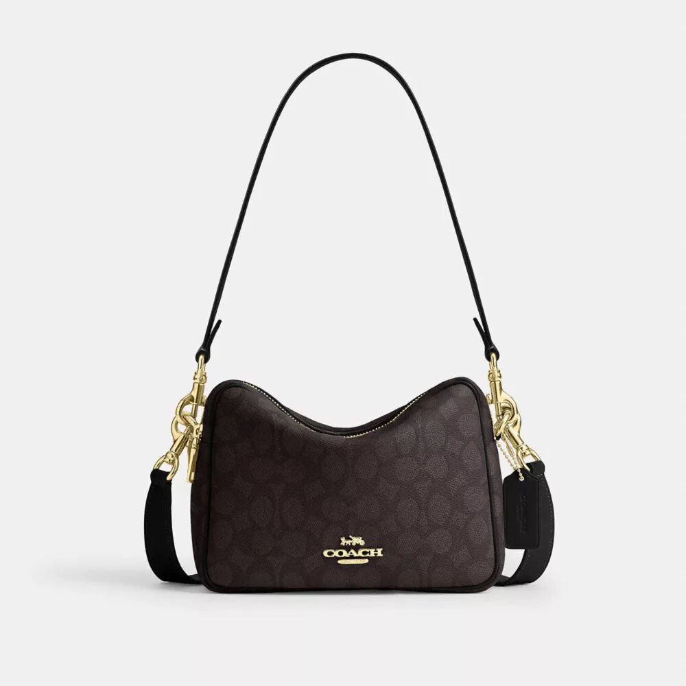 Bolso bandolera Carey en Signature Canvas