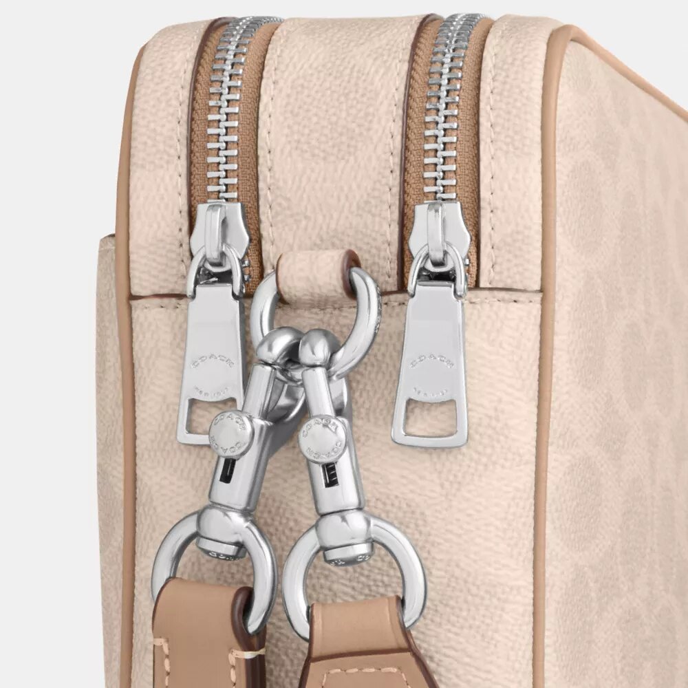 Bolso bandolera Carey en Signature Canvas