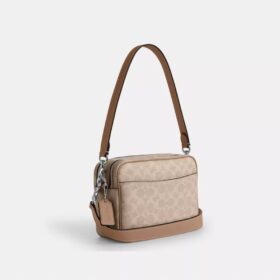 Bolso bandolera Carey en Signature Canvas