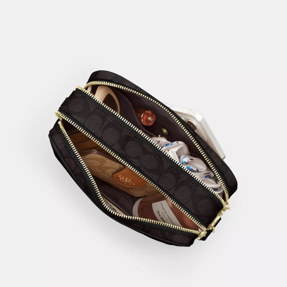 Bolso bandolera Carey en Signature Canvas
