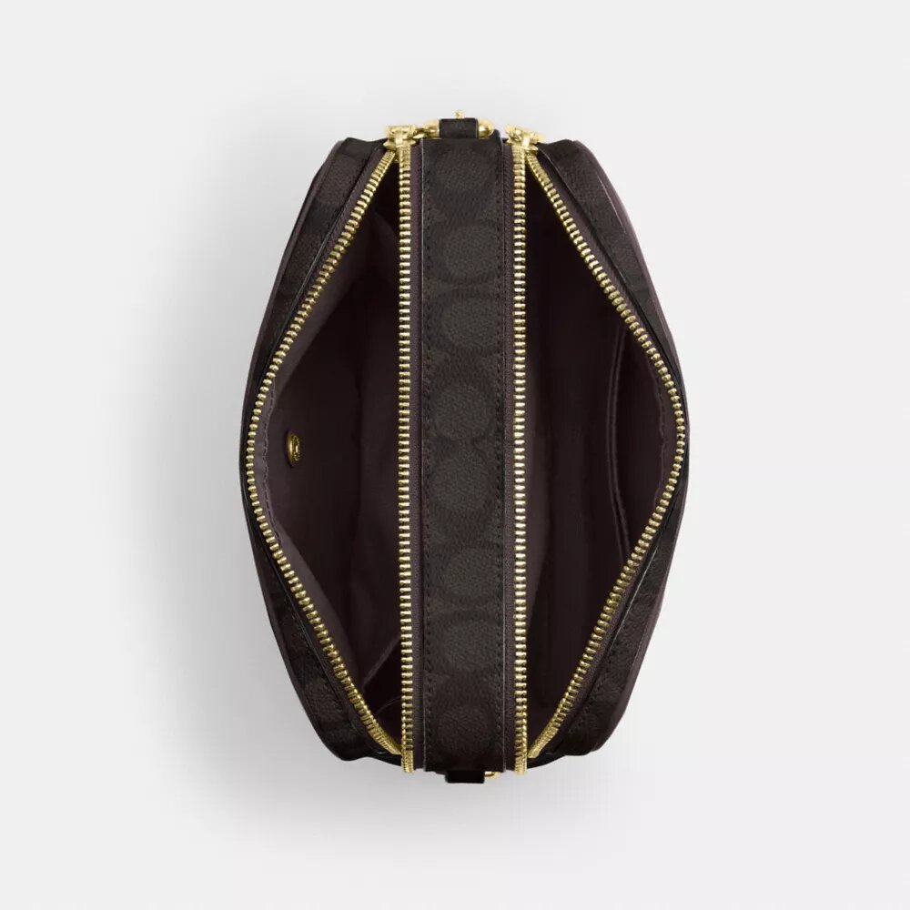 Bolso bandolera Carey en Signature Canvas