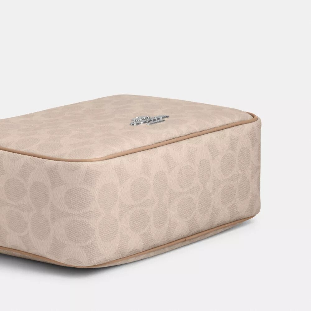 Bolso bandolera Carey en Signature Canvas