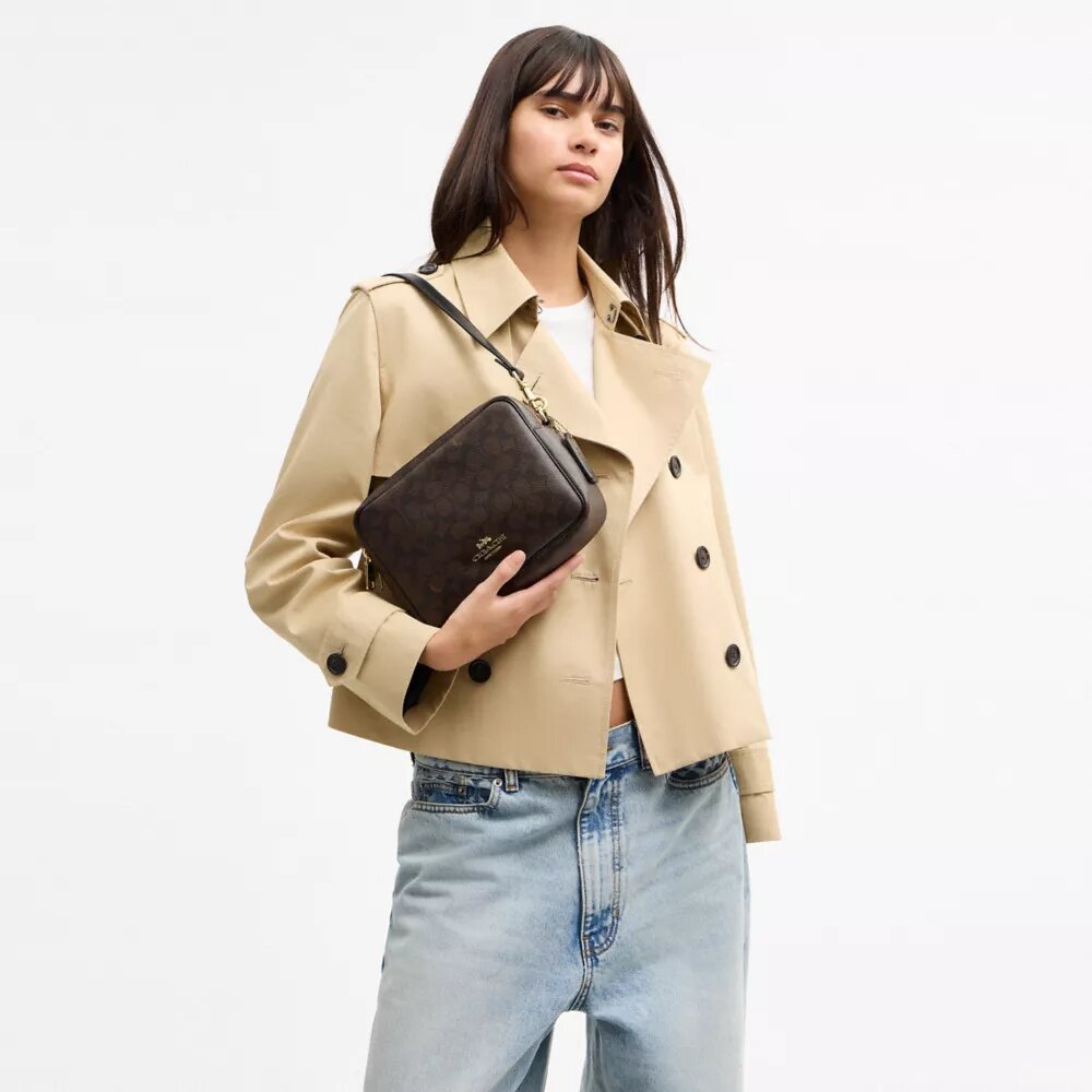 Bolso bandolera Carey en Signature Canvas