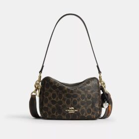 Bolso bandolera Carey en Signature Canvas con Charms