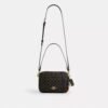 Bolso bandolera Carey en Signature Canvas con Charms