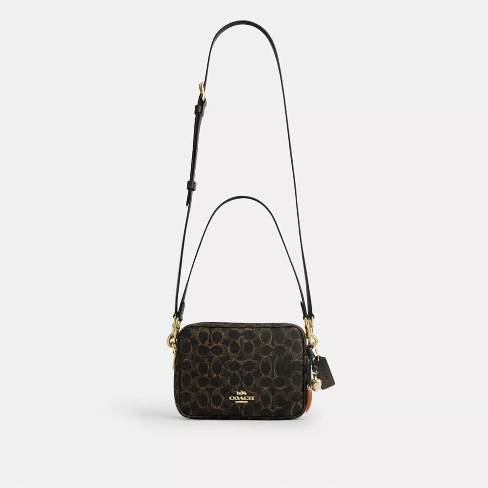 Bolso bandolera Carey en Signature Canvas con Charms