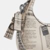 Bolso bandolera Carmen Mini con estampado de periódico