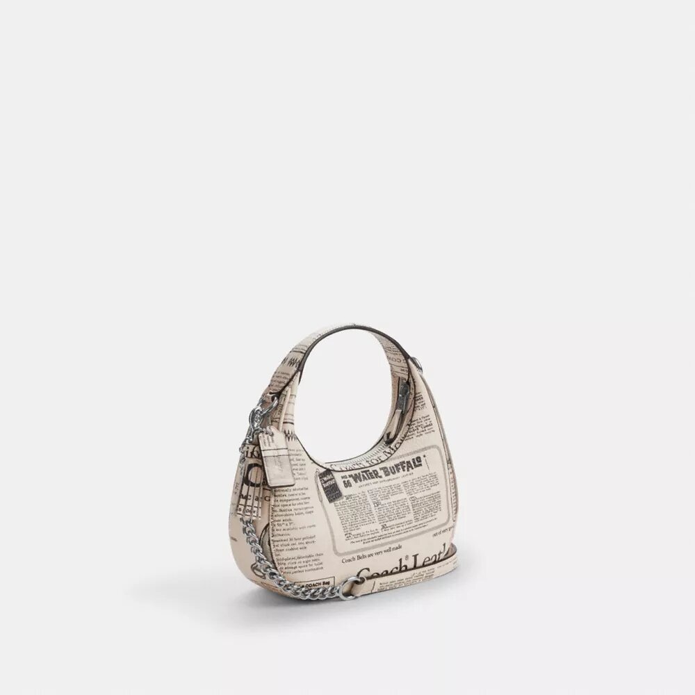 Bolso bandolera Carmen Mini con estampado de periódico
