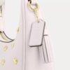 Bolso bandolera Carmen Mini con remaches en forma de corazón