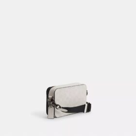 Bolso bandolera Charter Slim en Signature Canvas