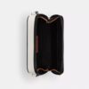 Bolso bandolera Charter Slim en Signature Canvas
