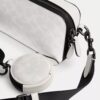 Bolso bandolera Charter Slim en Signature Canvas