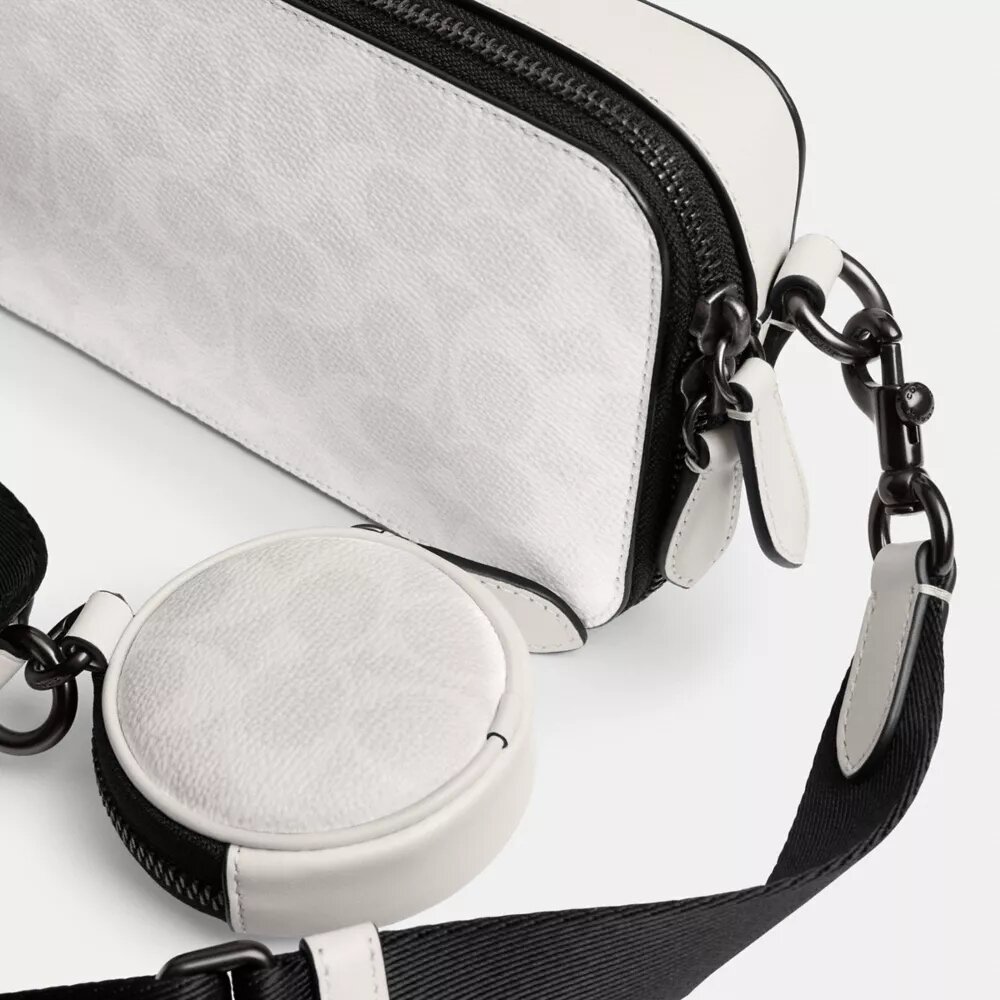 Bolso bandolera Charter Slim en Signature Canvas