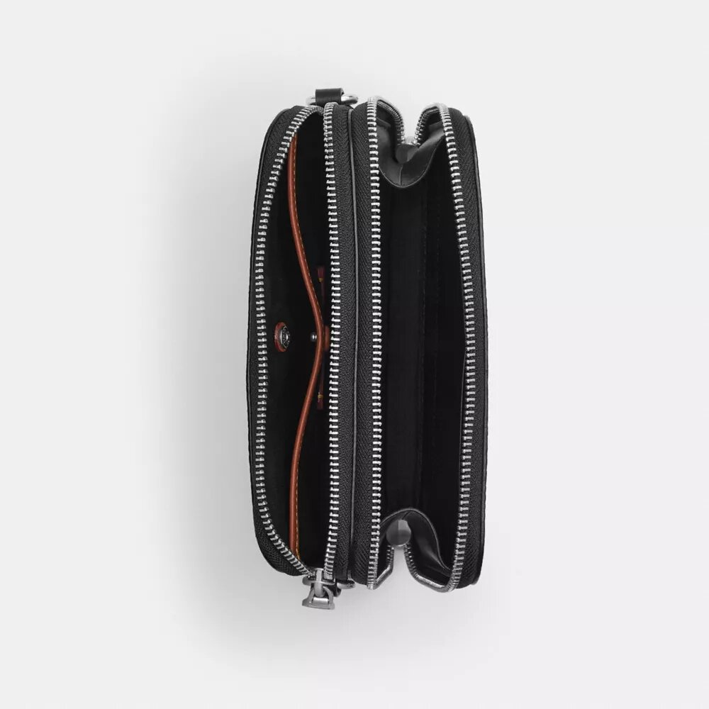 Bolso bandolera Clinton en Signature Canvas