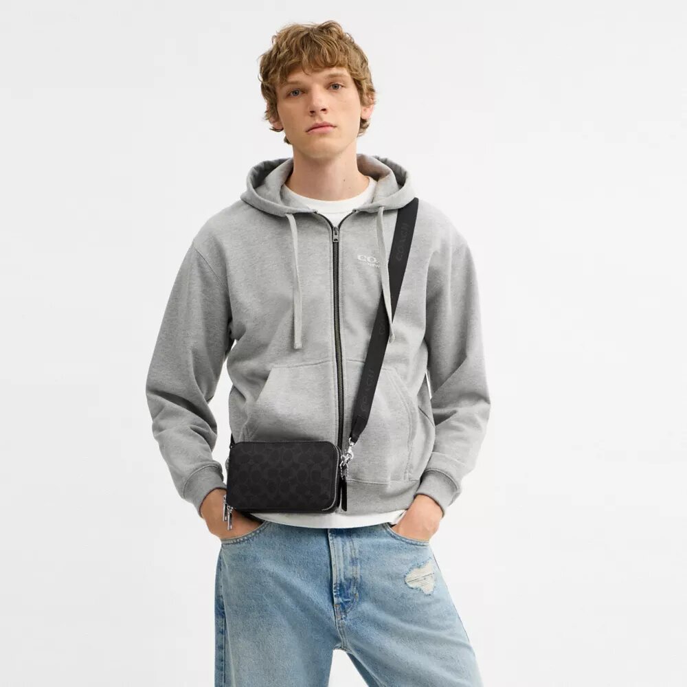 Bolso bandolera Clinton en Signature Canvas