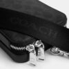 Bolso bandolera Clinton en Signature Canvas