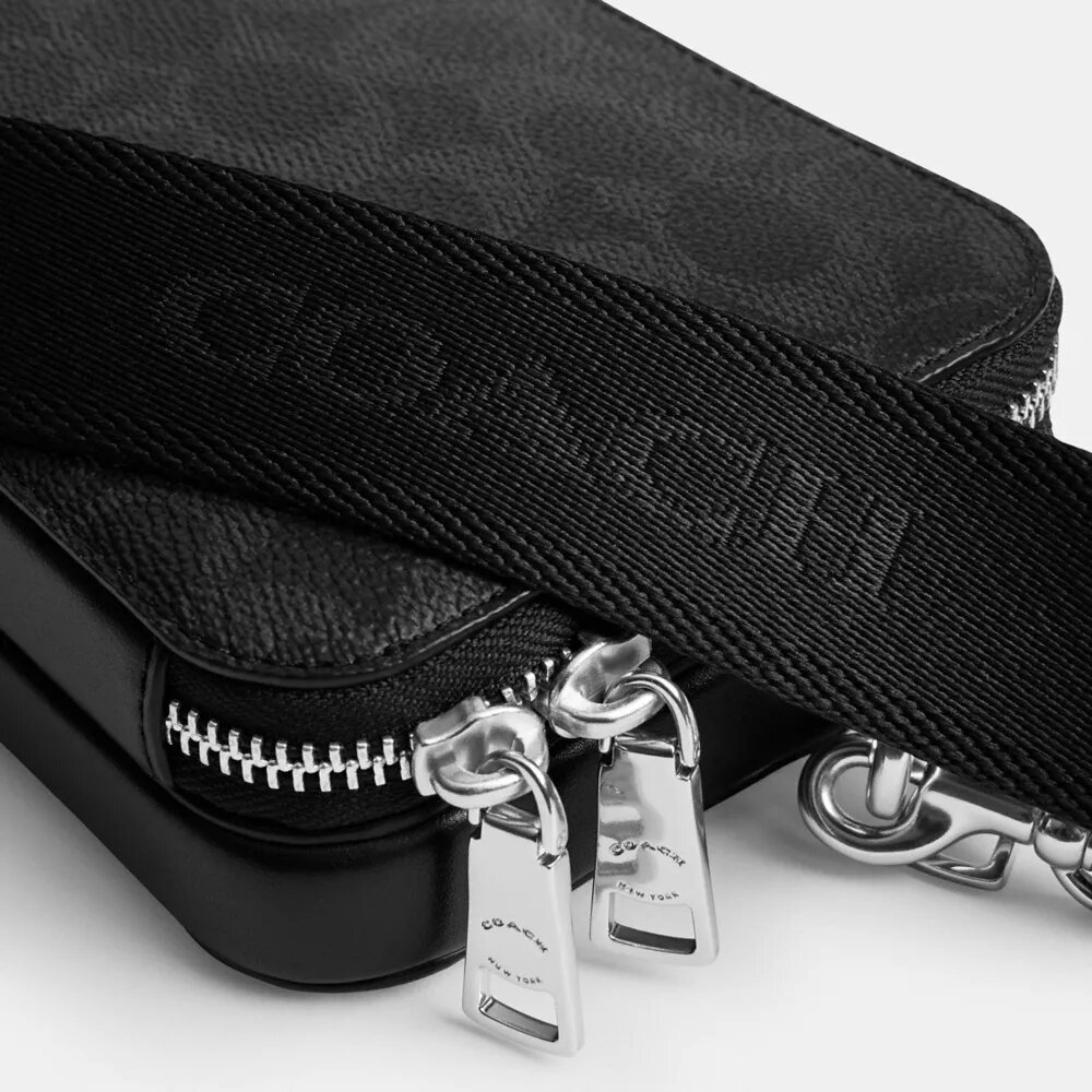 Bolso bandolera Clinton en Signature Canvas