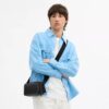 Bolso bandolera Colton 19 en Signature Canvas
