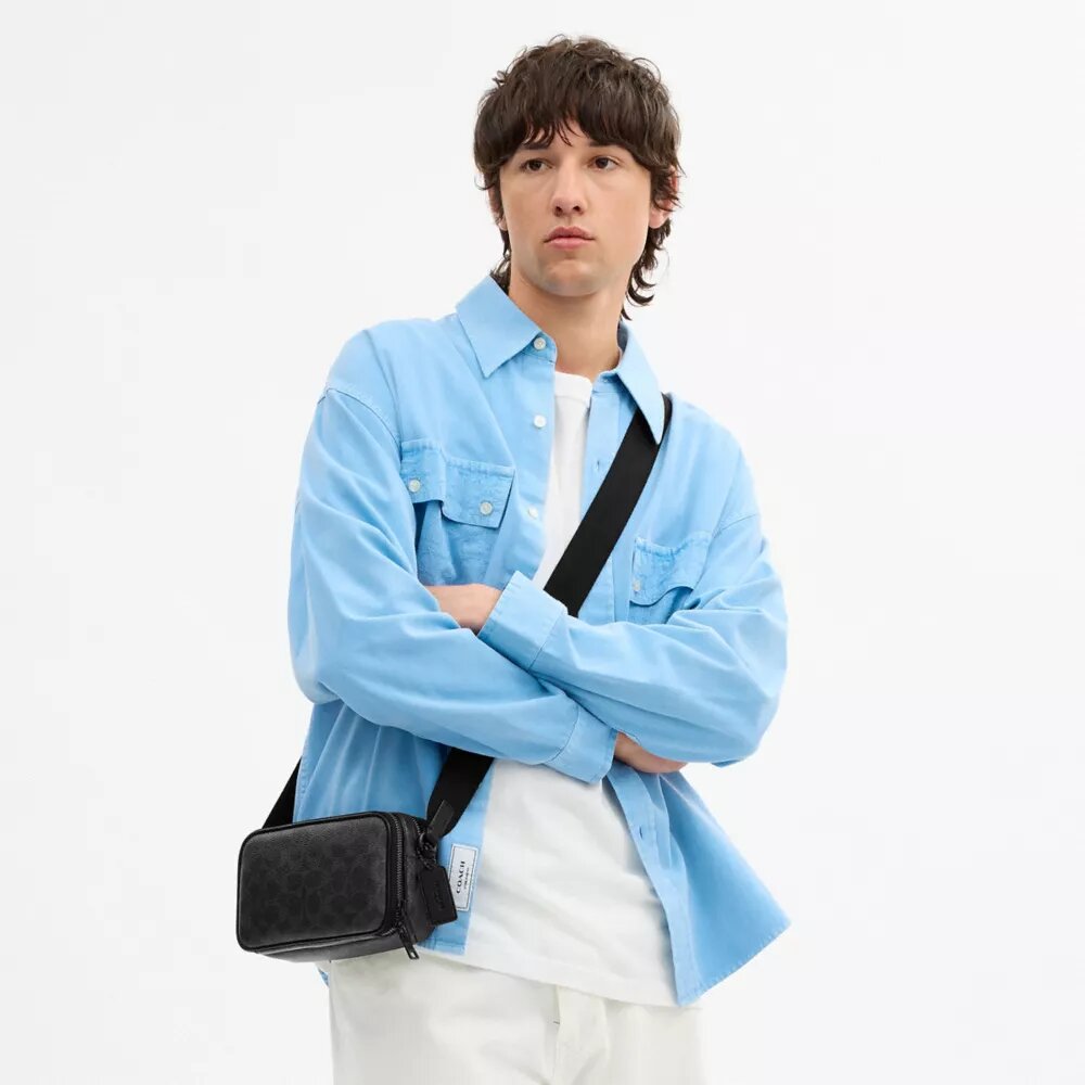 Bolso bandolera Colton 19 en Signature Canvas