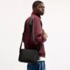 Bolso bandolera Colton 25 en Signature Canvas