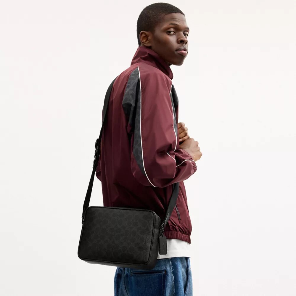 Bolso bandolera Colton 25 en Signature Canvas