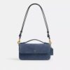 Bolso bandolera con asa superior Elora