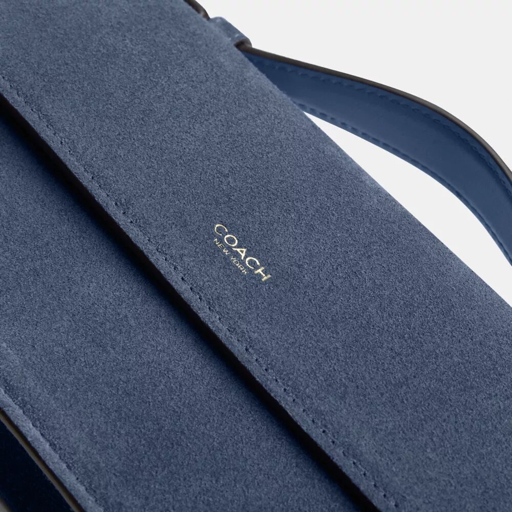Bolso bandolera con asa superior Elora