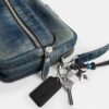Bolso bandolera Dakota de denim de algodón regenerativo con Charms
