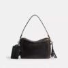 Bolso bandolera Dakota en piel desgastada con Charms