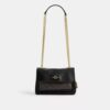 Bolso bandolera Elodie 18 en Signature Canvas