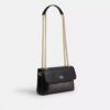Bolso bandolera Elodie 18 en Signature Canvas