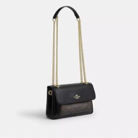 Bolso bandolera Elodie 18 en Signature Canvas