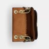 Bolso bandolera Elodie 18 en Signature Canvas