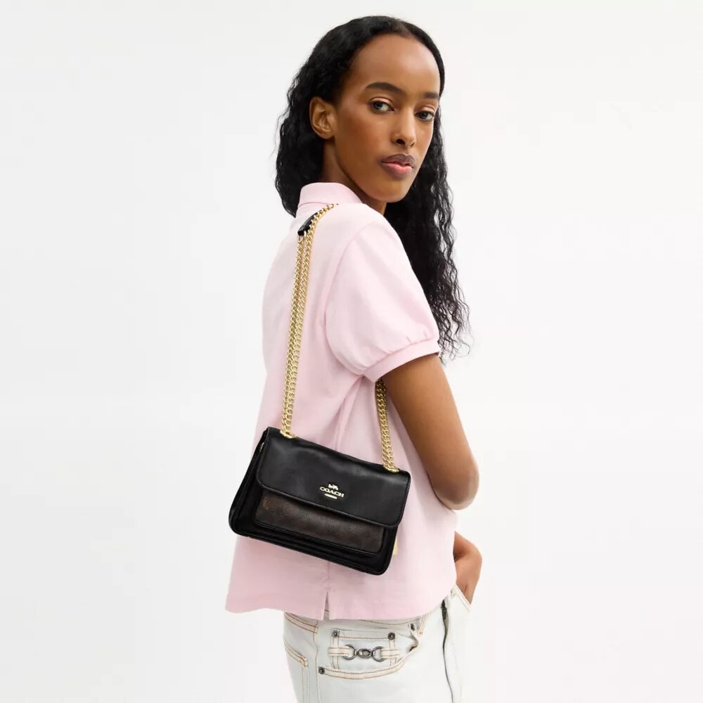 Bolso bandolera Elodie 18 en Signature Canvas