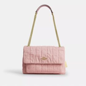 Bolso bandolera Elodie en denim desgastado con acolchado