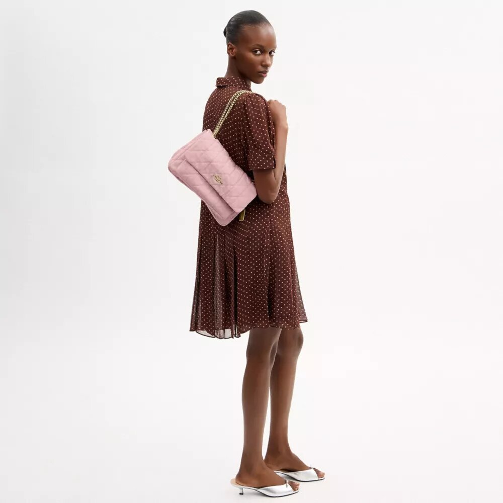 Bolso bandolera Elodie en denim desgastado con acolchado