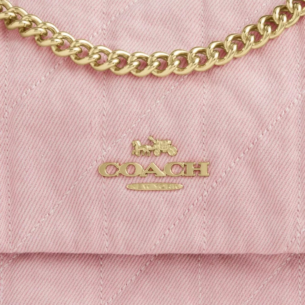 Bolso bandolera Elodie en denim desgastado con acolchado