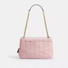 Bolso bandolera Elodie en denim desgastado con acolchado