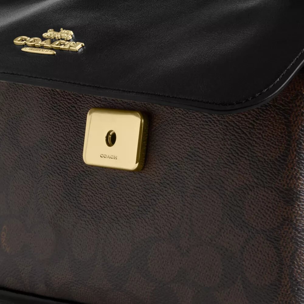 Bolso bandolera Elodie en Signature Canvas