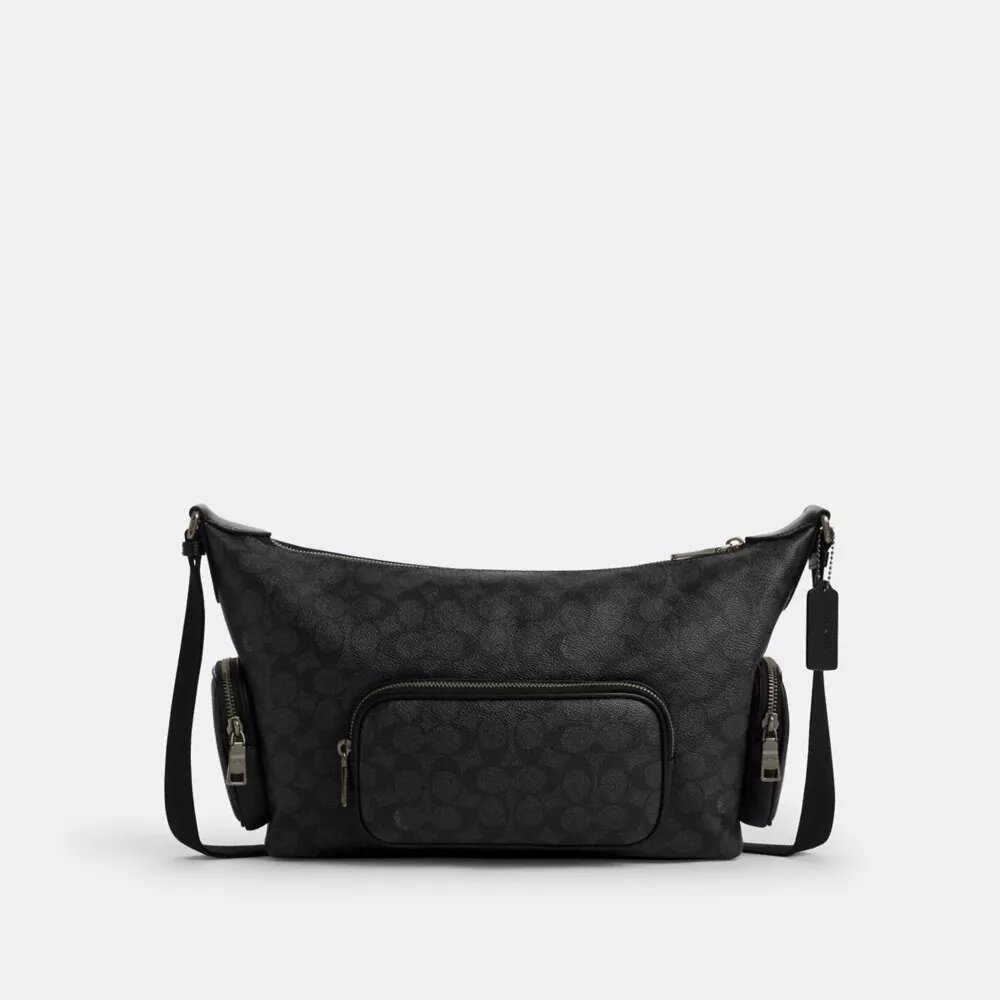 Bolso bandolera Finn con bolsillos en Signature Canvas