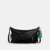Bolso bandolera Finn con bolsillos y Charms