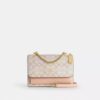 Bolso bandolera Klare en Signature Canvas